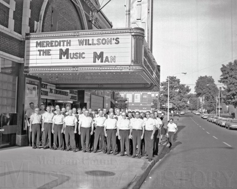 Members of the Bloomington chapter pose outside of a local theatre for the premiere of The Music Man in 1962.